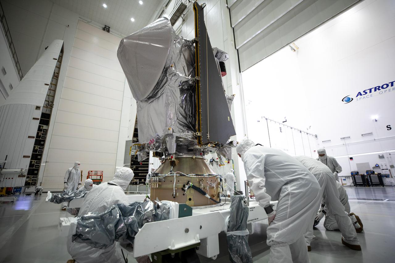 NASA’s Lucy spacecraft is moved from the Work Processing Cell to the Airlock inside the Astrotech Space Operations Facility in Titusville, Florida, on Sept. 29, 2021. A United Launch Alliance V 401 rocket roared off the pad at Cape Canaveral Space Force Station’s Space Launch Complex 41 on Oct. 16, 2021, at 5:34 a.m. EDT, carrying Lucy into space. During its 12-year primary mission, Lucy will explore a record-breaking number of asteroids, flying by one asteroid in the solar system’s main belt and seven Trojan asteroids. Lucy is the first space mission to study the Trojan asteroids, which hold vital clues to the formation of our solar system.