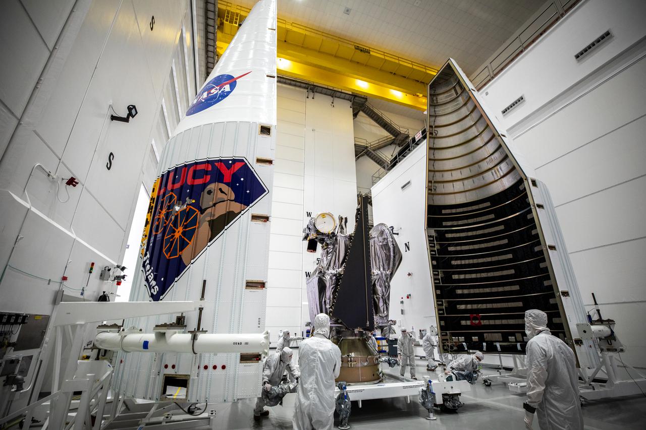 NASA’s Lucy spacecraft is moved from the Work Processing Cell to the Airlock inside the Astrotech Space Operations Facility in Titusville, Florida, on Sept. 29, 2021. A United Launch Alliance V 401 rocket roared off the pad at Cape Canaveral Space Force Station’s Space Launch Complex 41 on Oct. 16, 2021, at 5:34 a.m. EDT, carrying Lucy into space. During its 12-year primary mission, Lucy will explore a record-breaking number of asteroids, flying by one asteroid in the solar system’s main belt and seven Trojan asteroids. Lucy is the first space mission to study the Trojan asteroids, which hold vital clues to the formation of our solar system.