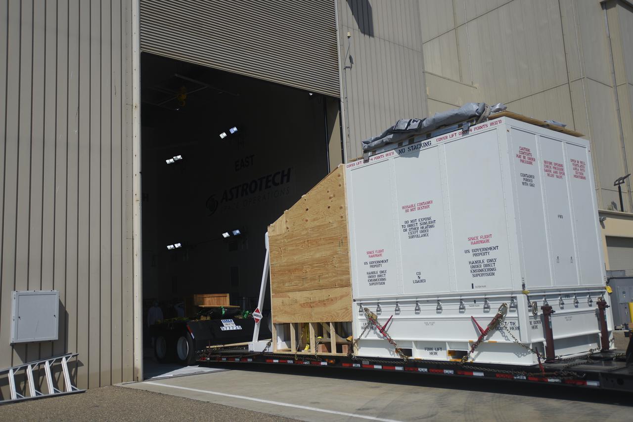 NASA’s Double Asteroid Redirection Test (DART) spacecraft, packed in its shipping container, is moved into the Astrotech Space Operations Facility at Vandenberg Space Force Base in California on Oct. 2, 2021. Inside the facility, workers will unpack the spacecraft and complete a series of final tests and checkouts to confirm it is ready for launch. DART is the first mission to test technologies for preventing an impact of Earth by a hazardous asteroid. The mission is targeted to launch on Nov. 23, 2021, aboard a SpaceX Falcon 9 rocket from Vandenberg. NASA’s Launch Services Program, based at Kennedy Space Center, America’s multi-user spaceport, is managing the launch. 