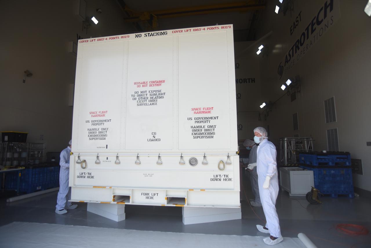 NASA’s Double Asteroid Redirection Test (DART) spacecraft, packed in its shipping container, is inside the Astrotech Space Operations Facility at Vandenberg Space Force Base in California on Oct. 2, 2021. Inside the facility, workers will unpack the spacecraft and complete a series of final tests and checkouts to confirm it is ready for launch. DART is the first mission to test technologies for preventing an impact of Earth by a hazardous asteroid. The mission is targeted to launch on Nov. 23, 2021, aboard a SpaceX Falcon 9 rocket from Vandenberg. NASA’s Launch Services Program, based at Kennedy Space Center, America’s multi-user spaceport, is managing the launch. 