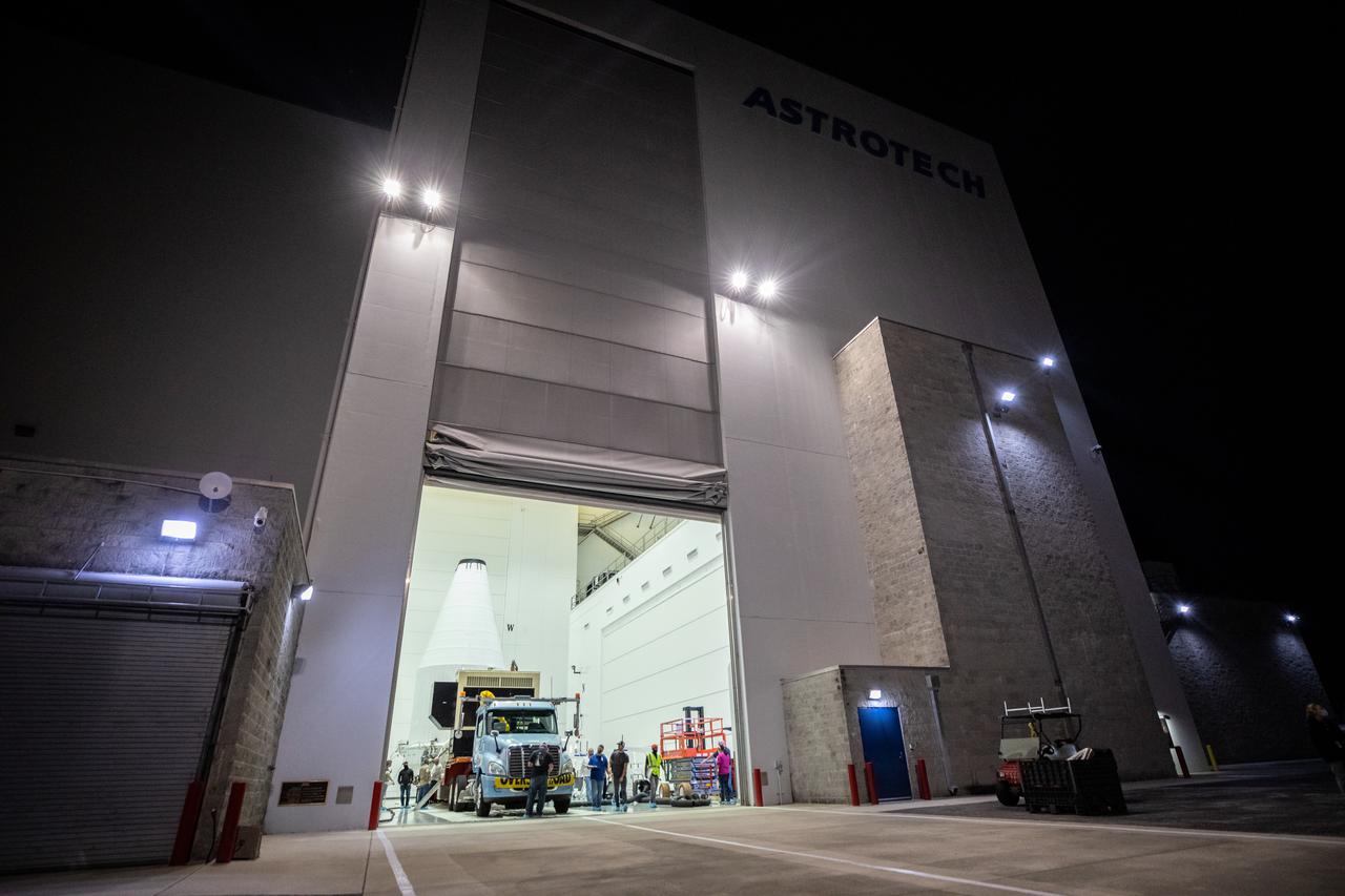 The Lucy spacecraft, encapsulated in its payload fairing, exits the Astrotech Space Operations Facility in Titusville, Florida on Oct. 7, 2021. The spacecraft will be transported to nearby Space Launch Complex 41 at Cape Canaveral Space Force Station. The encapsulated spacecraft will be hoisted up and into the Vertical Integration Facility where it will be lowered down and secured on the United Launch Alliance (ULA) Atlas V Centaur second stage. Lucy is scheduled to launch no earlier than Saturday, Oct. 16, on the ULA Atlas V 401 rocket from Launch Pad 41. NASA’s Launch Services Program, based at Kennedy Space Center, America’s premier multi-user spaceport, is managing the launch. Over its 12-year primary mission, Lucy will explore a record-breaking number of asteroids, flying by one asteroid in the solar system’s main belt and seven Trojan asteroids. Additionally, Lucy’s path will circle back to Earth three times for gravity assists, making it the first spacecraft ever to return to the vicinity of Earth from the outer solar system.