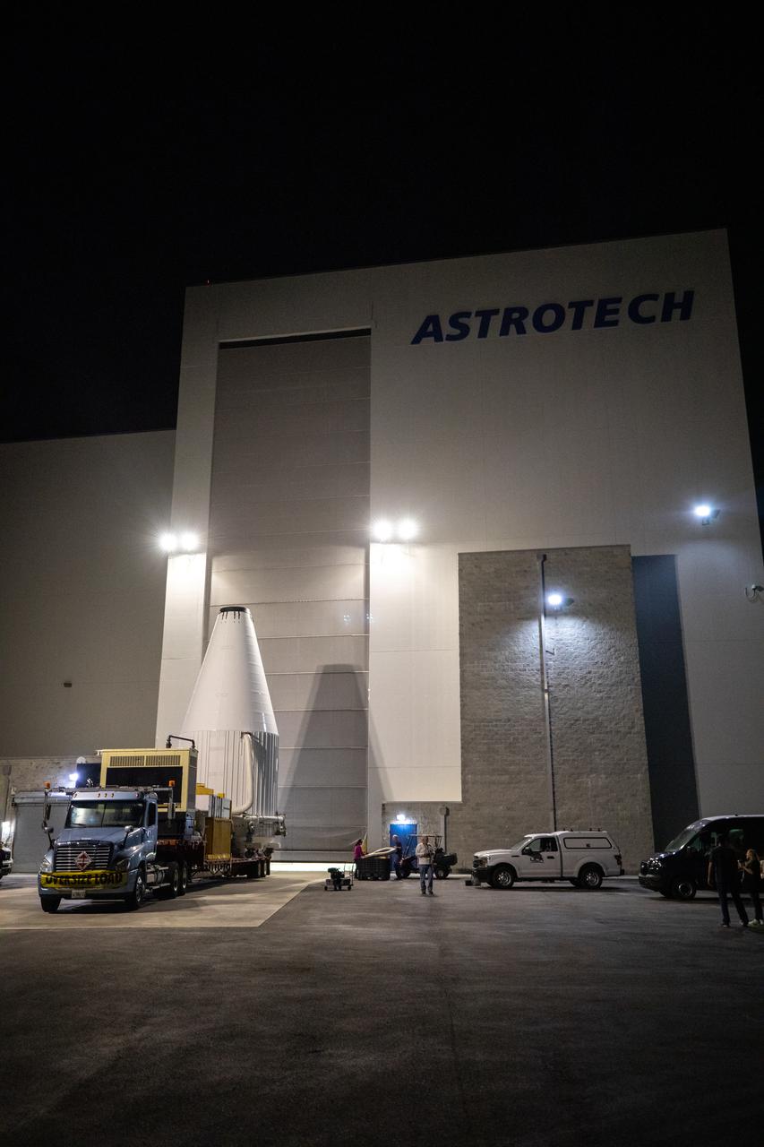 The Lucy spacecraft, encapsulated in its payload fairing, exits the Astrotech Space Operations Facility in Titusville, Florida on Oct. 7, 2021. The spacecraft will be transported to nearby Space Launch Complex 41 at Cape Canaveral Space Force Station. The encapsulated spacecraft will be hoisted up and into the Vertical Integration Facility where it will be lowered down and secured on the United Launch Alliance (ULA) Atlas V Centaur second stage.  Lucy is scheduled to launch no earlier than Saturday, Oct. 16, on the ULA Atlas V 401 rocket from Launch Pad 41. NASA’s Launch Services Program, based at Kennedy Space Center, America’s premier multi-user spaceport, is managing the launch. Over its 12-year primary mission, Lucy will explore a record-breaking number of asteroids, flying by one asteroid in the solar system’s main belt and seven Trojan asteroids. Additionally, Lucy’s path will circle back to Earth three times for gravity assists, making it the first spacecraft ever to return to the vicinity of Earth from the outer solar system.