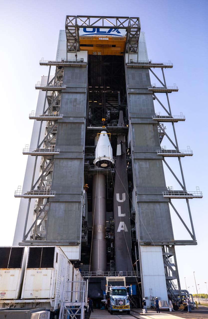 The payload fairing containing NASA’s Lucy spacecraft is hoisted up at the Vertical Integration Facility at Space Launch Complex 41 at Cape Canaveral Space Force Station in Florida on Oct. 7, 2021. It will be lowered onto the United Launch Alliance (ULA) Atlas V Centaur second stage. Lucy is scheduled to launch no earlier than Saturday, Oct. 16, on the ULA Atlas V 401 rocket from Launch Pad 41. NASA’s Launch Services Program, based at Kennedy Space Center, America’s premier multi-user spaceport, is managing the launch. Over its 12-year primary mission, Lucy will explore a record-breaking number of asteroids, flying by one asteroid in the solar system’s main belt and seven Trojan asteroids. Additionally, Lucy’s path will circle back to Earth three times for gravity assists, making it the first spacecraft ever to return to the vicinity of Earth from the outer solar system.