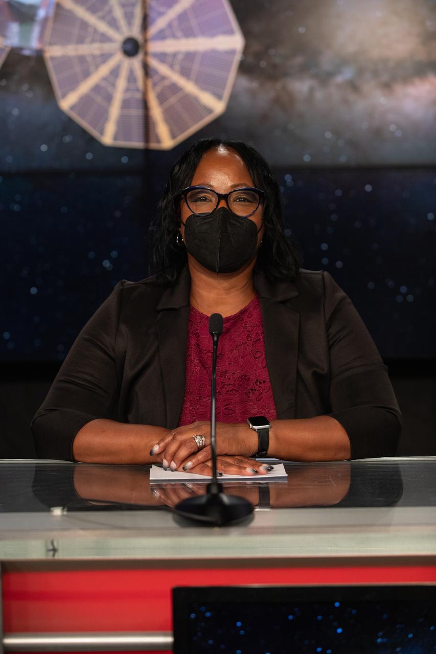 Donya Douglas-Bradshaw, Lucy project manager at NASA’s Goddard Space Flight Center, is introduced during a prelaunch news conference for the Lucy mission held inside the TV Auditorium at NASA’s Kennedy Space Center in Florida on Oct. 13, 2021. The mission is scheduled to launch no earlier than 5:34 a.m. EDT Saturday, Oct. 16, on a United Launch Alliance Atlas V 401 rocket from Space Launch Complex 41 at Cape Canaveral Space Force Station. NASA’s Launch Services Program, based at Kennedy, is managing the launch. During its 12-year primary mission, Lucy will explore a record-breaking number of asteroids, flying by one asteroid in the solar system’s main belt and seven Trojan asteroids. Additionally, Lucy’s path will circle back to Earth three times for gravity assists, making it the first spacecraft to return to the vicinity of Earth from the outer solar system.