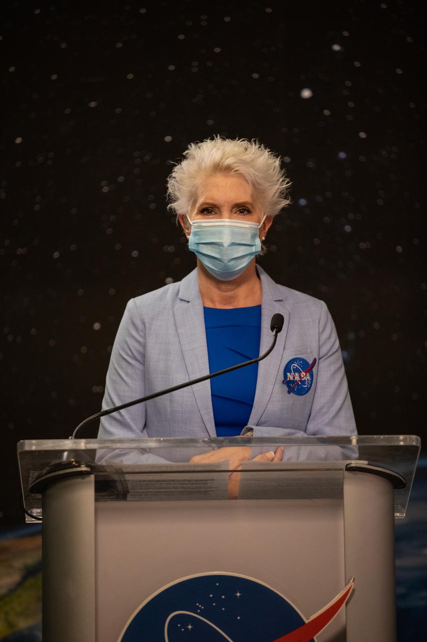 Tammy Long, NASA Communications, addresses the audience during a prelaunch news conference for the Lucy mission held inside the TV Auditorium at NASA’s Kennedy Space Center in Florida on Oct. 13, 2021. The mission is targeted to launch at 5:34 a.m. EDT Saturday, Oct. 16, on a United Launch Alliance Atlas V 401 rocket from Space Launch Complex 41 at Cape Canaveral Space Force Station. NASA’s Launch Services Program, based at Kennedy, is managing the launch. Lucy is the first space mission to study the Trojan asteroids, which hold vital clues to the formation of our solar system.