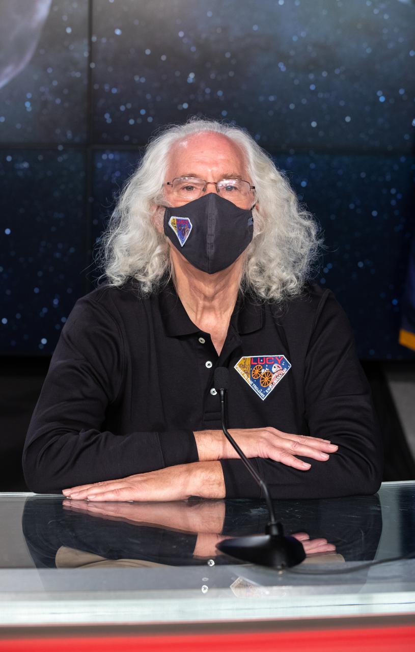 Dennis Reuter, L’Ralph Instrument Principal Investigator at NASA’s Goddard Space Flight Center, is introduced during a science briefing for the Lucy mission held inside the TV Auditorium at NASA’s Kennedy Space Center in Florida on Oct. 14, 2021. The mission is scheduled to launch at 5:34 a.m. EDT Saturday, Oct. 16, on a United Launch Alliance Atlas V 401 rocket from Space Launch Complex 41 at Cape Canaveral Space Force Station. NASA’s Launch Services Program, based at Kennedy, is managing the launch. During its 12-year primary mission, Lucy will explore a record-breaking number of asteroids, flying by one asteroid in the solar system’s main belt and seven Trojan asteroids. Additionally, Lucy’s path will circle back to Earth three times for gravity assists, making it the first spacecraft to return to the vicinity of Earth from the outer solar system.
