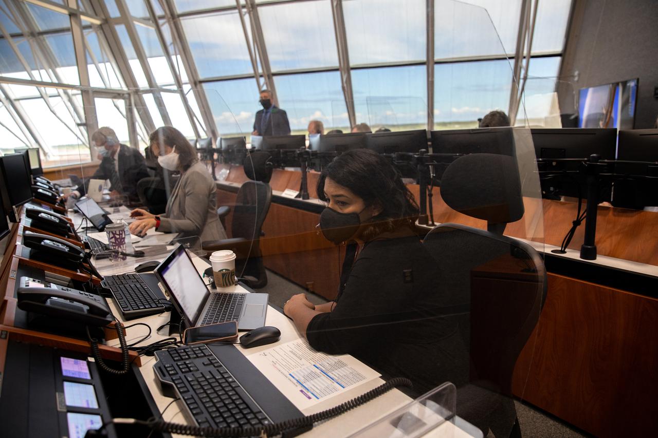 Dr. Sharmi Watkins, Artemis I deputy chief medical officer, participates in the 11th terminal countdown simulation for the Artemis I launch inside Kennedy Space Center’s Launch Control Center on Oct. 14, 2021. The event marked the first time members of NASA’s mission management team, launch team, and contractor Jacobs conducted the simulation together. During Artemis I, the agency’s Orion spacecraft will lift off from Kennedy aboard NASA’s most powerful rocket – the Space Launch System – to fly farther than any spacecraft built for humans has ever flown. Through NASA’s Artemis missions, the agency, along with commercial and international partners, will establish a sustainable human presence on the Moon to prepare for missions to Mars.