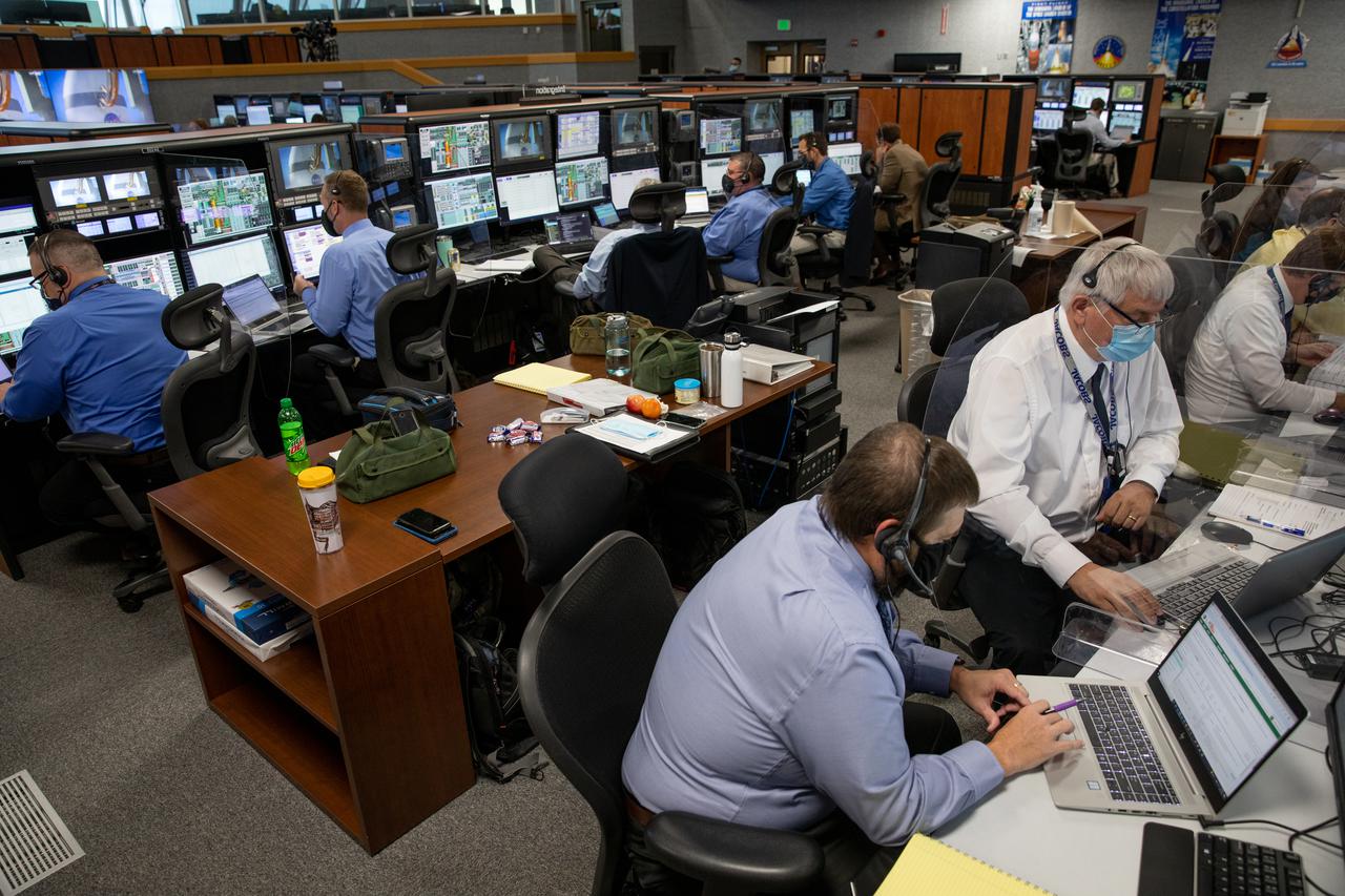 Members of NASA’s mission management team, launch team, and contractor Jacobs participate in the 11th terminal countdown simulation for the Artemis I launch inside Kennedy Space Center’s Launch Control Center on Oct. 14, 2021. It marked the first time these two teams conducted the simulation together. During Artemis I, the agency’s Orion spacecraft will lift off from Kennedy aboard NASA’s most powerful rocket – the Space Launch System – to fly farther than any spacecraft built for humans has ever flown. Through NASA’s Artemis missions, the agency, along with commercial and international partners, will establish a sustainable human presence on the Moon to prepare for missions to Mars.