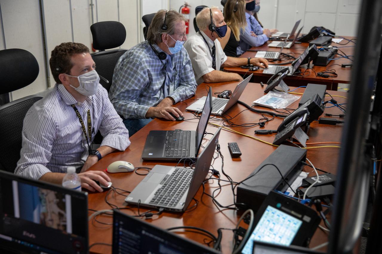 Members of Artemis I imagery console participate in the 11th terminal countdown simulation for the Artemis I launch inside Kennedy Space Center’s Launch Control Center on Oct. 14, 2021. It marked the first time NASA’s mission management team, launch team, and contractor Jacobs conducted the simulation together. During Artemis I, the agency’s Orion spacecraft will lift off from Kennedy aboard NASA’s most powerful rocket – the Space Launch System – to fly farther than any spacecraft built for humans has ever flown. Through NASA’s Artemis missions, the agency, along with commercial and international partners, will establish a sustainable human presence on the Moon to prepare for missions to Mars.