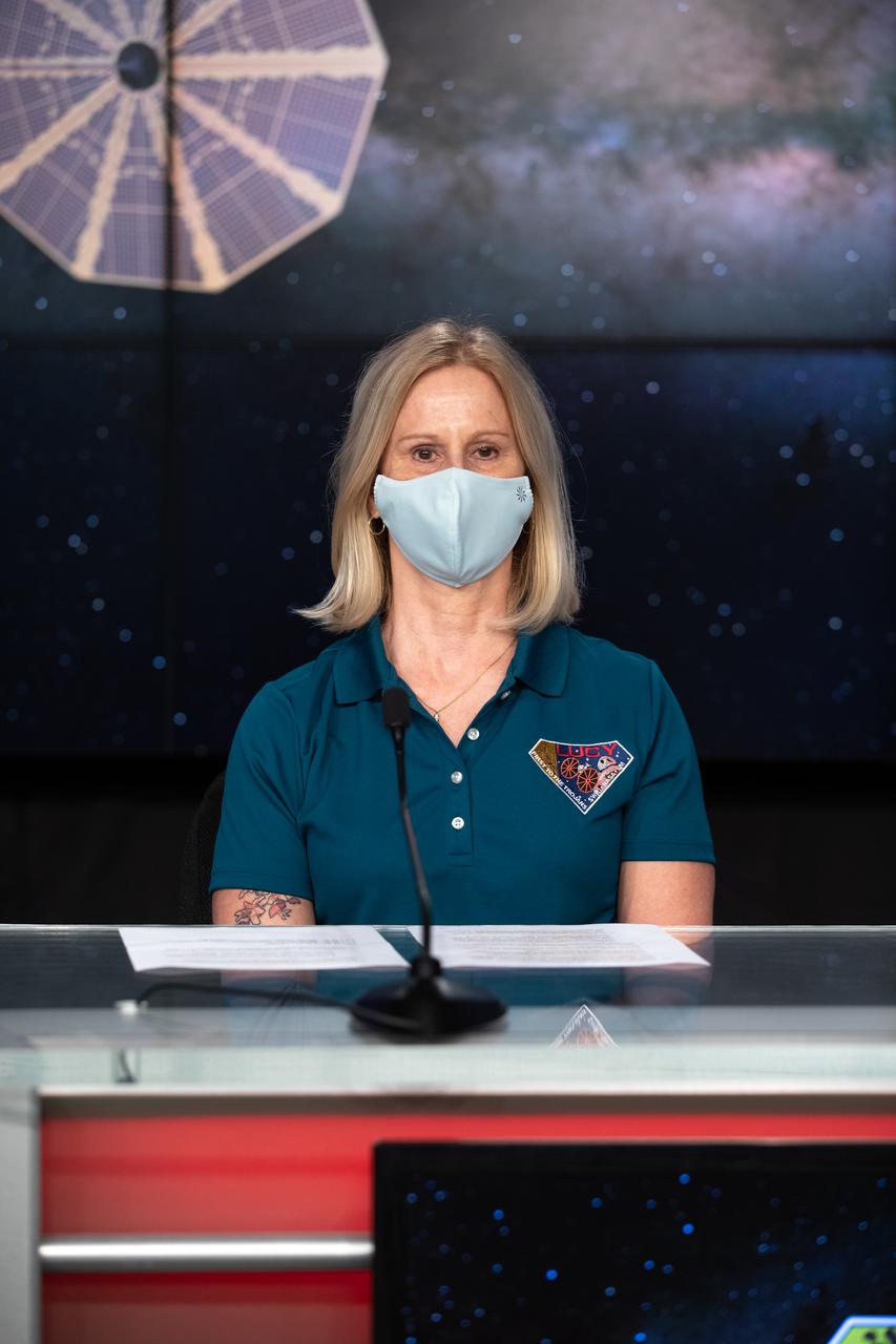 Joan Salute, Planetary Science Division associate director, Flight Programs, NASA HQ, is introduced during an engineering briefing for the Lucy mission held inside the TV Auditorium at NASA’s Kennedy Space Center in Florida on Oct. 14, 2021. The mission is scheduled to launch at 5:34 a.m. EDT Saturday, Oct. 16, on a United Launch Alliance Atlas V 401 rocket from Space Launch Complex 41 at Cape Canaveral Space Force Station. NASA’s Launch Services Program, based at Kennedy, is managing the launch. During its 12-year primary mission, Lucy will explore a record-breaking number of asteroids, flying by one asteroid in the solar system’s main belt and seven Trojan asteroids. Additionally, Lucy’s path will circle back to Earth three times for gravity assists, making it the first spacecraft to return to the vicinity of Earth from the outer solar system. 