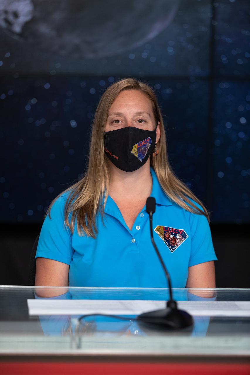 Jessica Lounsbury, Lucy Project Systems engineer at NASA’s Goddard Space Flight Center, is introduced during an engineering briefing for the Lucy mission held inside the TV Auditorium at NASA’s Kennedy Space Center in Florida on Oct. 14, 2021. The mission is scheduled to launch at 5:34 a.m. EDT Saturday, Oct. 16, on a United Launch Alliance Atlas V 401 rocket from Space Launch Complex 41 at Cape Canaveral Space Force Station. NASA’s Launch Services Program, based at Kennedy, is managing the launch. During its 12-year primary mission, Lucy will explore a record-breaking number of asteroids, flying by one asteroid in the solar system’s main belt and seven Trojan asteroids. Additionally, Lucy’s path will circle back to Earth three times for gravity assists, making it the first spacecraft to return to the vicinity of Earth from the outer solar system. 