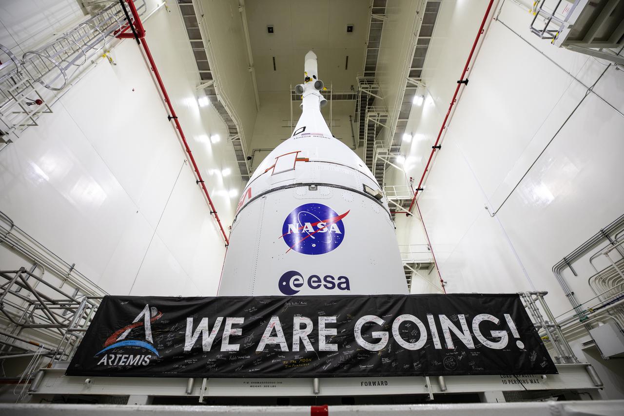 Inside the Launch Abort System Facility (LASF) at NASA’s Kennedy Space Center in Florida, the fully assembled Orion spacecraft for the agency’s Artemis I mission is prepared for transport on Oct. 18, 2021. In the early morning hours of Oct. 19, Orion was moved from the LASF into the Vehicle Assembly Building, where teams with the agency’s Exploration Ground Systems and contractor Jacobs will lift and lower the spacecraft on top of the Space Launch System (SLS) rocket to complete assembly of NASA’s Moon rocket. The first in an increasingly complex set of missions, Artemis I will be an integrated flight test for Orion and SLS ahead of crewed flights to the Moon.