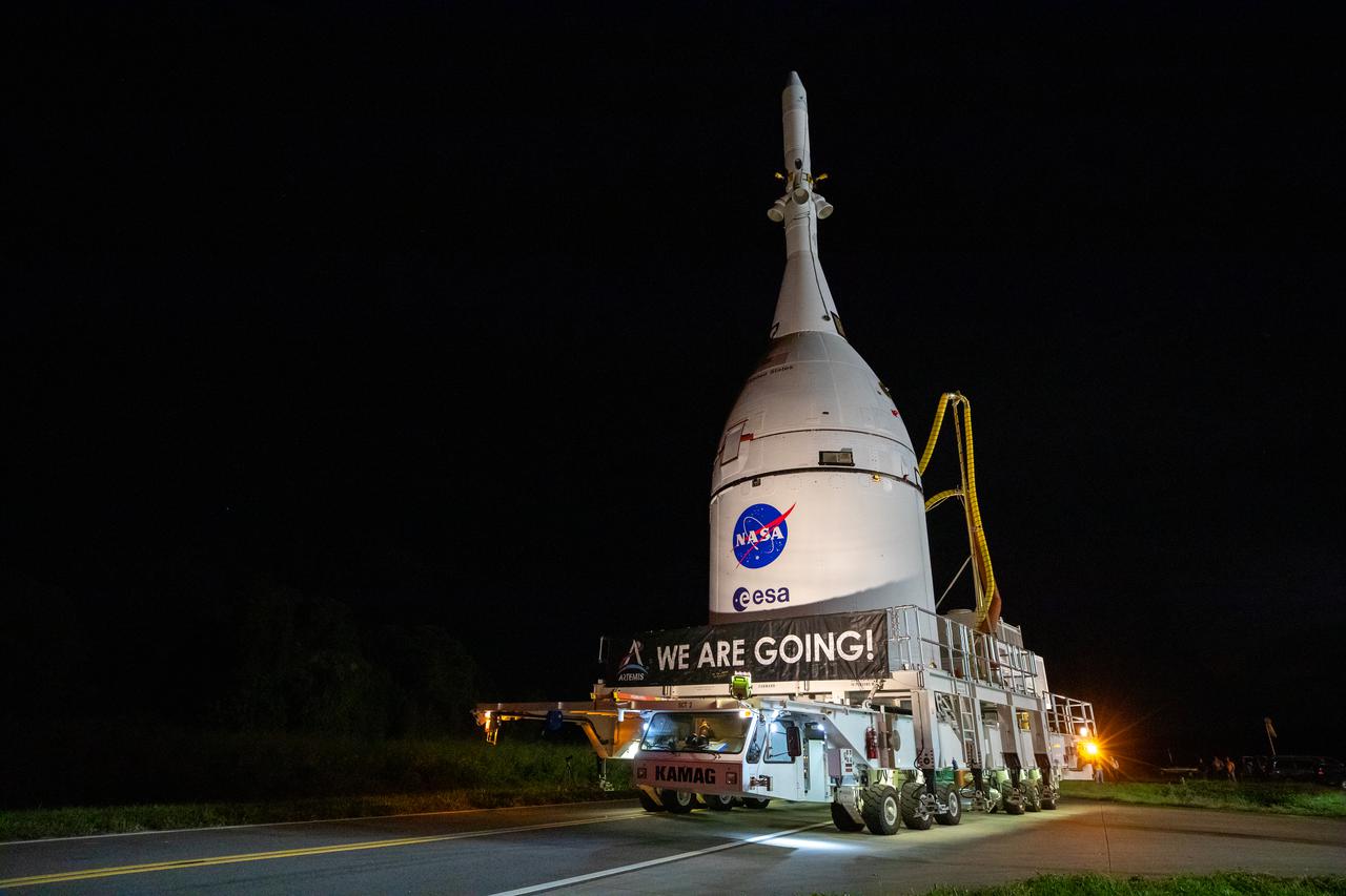 The Orion spacecraft for NASA’s Artemis I mission, fully assembled with its launch abort system, has moved out of the Launch Abort System Facility at Kennedy Space Center in Florida on Oct. 19, 2021. Orion is on its way to the Vehicle Assembly Building where it will join the already stacked flight hardware and be raised into position atop the Space Launch System rocket in High Bay 3. Launching in 2021, Artemis I will be an uncrewed test flight of the Orion spacecraft and Space Launch System rocket as an integrated system ahead of crewed flights to the Moon. Under Artemis, NASA aims to land the first woman and first person of color on the Moon and establish sustainable lunar exploration.