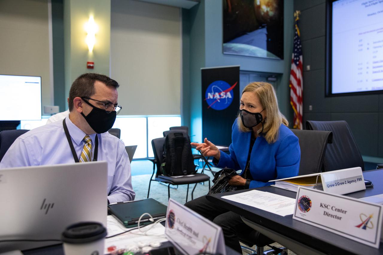 NASA and SpaceX managers participate in a Flight Readiness Review for the agency’s SpaceX Crew-3 mission at Kennedy Space Center in Florida on Oct. 25, 2021. International partners also participated. At right, Kennedy’s Center Director Janet Petro, speaks with J.D. Polk, chief Health and Medical officer. Crew-3 is scheduled to launch to the International Space Station from Kennedy’s Launch Complex 39A on Oct. 31, 2021 as part of NASA’s Commercial Crew Program. Liftoff of the Falcon 9 rocket and Crew Dragon spacecraft is targeted for 2:21 a.m. EDT.