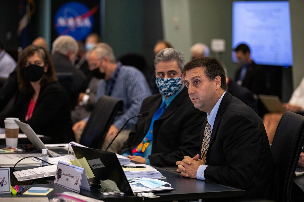 Joel Montalbano, at right, manager, International Space Station, NASA’s Johnson Space Center, participates in a Flight Readiness Review for the agency’s SpaceX Crew-3 mission at Kennedy Space Center in Florida on Oct. 25, 2021. International partners also participated. NASA and SpaceX mission managers held the FRR to confirm the SpaceX Falcon 9 and Crew Dragon spacecraft are ready for launch. Crew-3 is scheduled to launch to the International Space Station from Kennedy’s Launch Complex 39A on Oct. 31, 2021 as part of NASA’s Commercial Crew Program. Liftoff of the Falcon 9 rocket and Crew Dragon spacecraft is targeted for 2:21 a.m. EDT. 