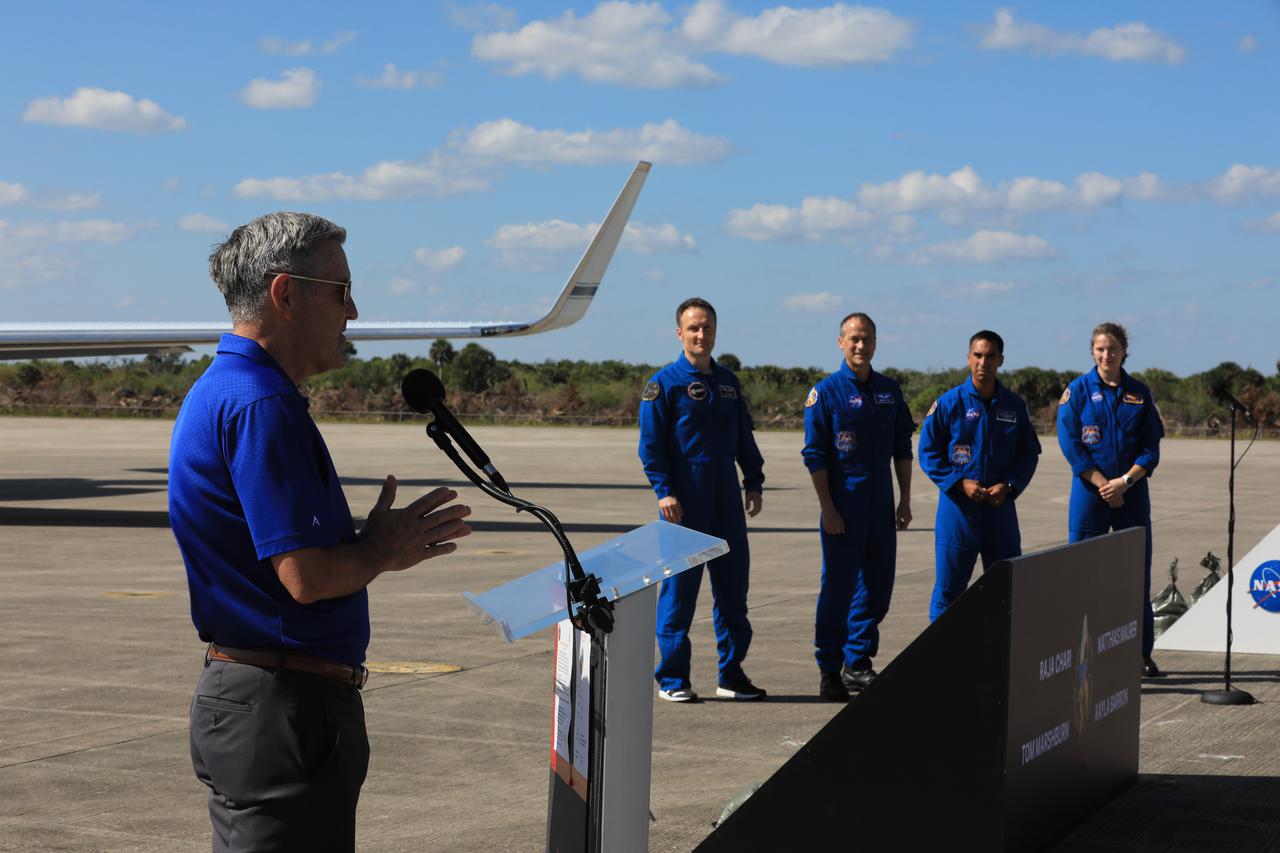 NASA Associate Administrator Bob Cabana greets the crew members of NASA’s SpaceX Crew-3 mission after their arrival at the center’s Launch and Landing Facility in Florida on Oct. 26, 2021. From left are European Space Agency astronaut Matthias Maurer, and NASA astronauts Tom Marshburn, Raja Chari, and Kayla Barron. Crew-3 will launch aboard the Crew Dragon on a SpaceX Falcon 9 rocket. Launch is targeted for 2:21 a.m. EDT on October 31 from Launch Complex 39A.