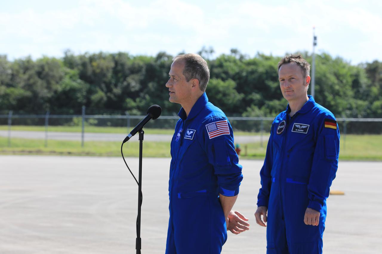 NASA astronaut Tom Marshburn speaks to members of the news media during crew arrival for NASA’s SpaceX Crew-3 mission at Kennedy Space Center’s Launch and Landing Facility in Florida on Oct. 26, 2021. Marshburn, along with NASA astronauts Raja Chari, and Kayla Barron, and European Space Agency astronaut Matthias Maurer arrived at the landing facility from Houston. The astronauts will launch aboard the Crew Dragon on a SpaceX Falcon 9 rocket on Oct. 31. Launch is targeted for 2:21 a.m. from Launch Complex 39A. Crew-3 is the third crew rotation flight for the agency’s Commercial Crew Program, and the first flight of a new Crew Dragon spacecraft.
