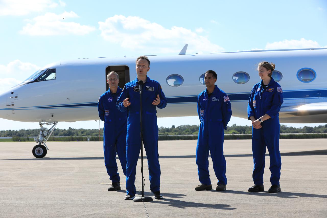 Matthias Mauer, European Space Agency astronaut, speaks to members of the news media during crew arrival for NASA’s SpaceX Crew-3 mission at Kennedy Space Center’s Launch and Landing Facility in Florida on Oct. 26, 2021. Mauer, along with from left, NASA astronauts Tom Marshburn, Raja Chari, and Kayla Barron arrived at the landing facility from Houston. The astronauts will launch aboard the Crew Dragon on a SpaceX Falcon 9 rocket on Oct. 31. Launch is targeted for 2:21 a.m. from Launch Complex 39A. Crew-3 is the third crew rotation flight for the agency’s Commercial Crew Program, and the first flight of a new Crew Dragon spacecraft.
