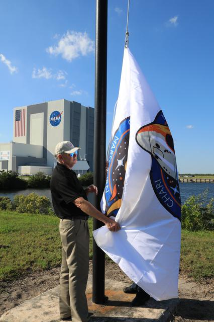 NASA image: Crew-3 Flag Raising by Countdown Clock