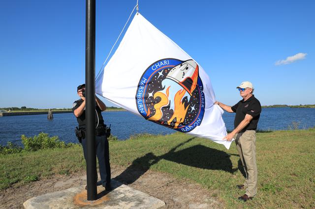 NASA image: Crew-3 Flag Raising by Countdown Clock