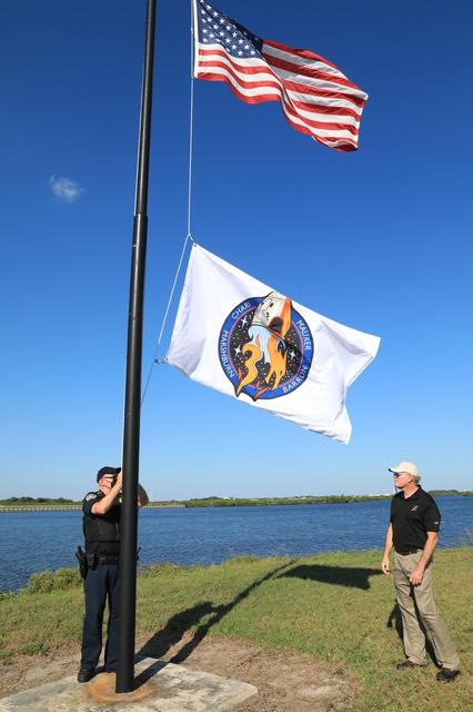 NASA image: Crew-3 Flag Raising by Countdown Clock