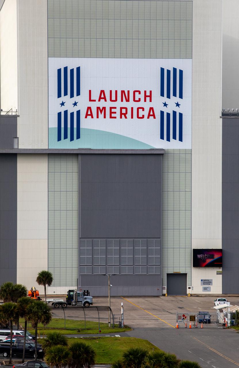 Seen here is the “Launch America” banner for NASA’s Commercial Crew Program (CCP) on the iconic Vehicle Assembly Building at the agency’s Kennedy Space Center in Florida on Oct. 28, 2021. NASA and SpaceX are preparing for Crew-3 – the third crew rotation flight to the International Space Station for CCP – and part of that includes conducting a dress rehearsal ahead of launch. On Oct. 28, NASA’s SpaceX Crew-3 astronauts and launch teams rehearsed countdown operations, concluding with the Go/No-Go poll for Falcon-9 fueling. The Crew-3 mission will carry NASA astronauts Raja Chari, Tom Marshburn, and Kayla Barron, as well as ESA (European Space Agency) astronaut Matthias Maurer to the space station for a six-month stay. SpaceX’s Falcon 9 rocket and Crew Dragon spacecraft are scheduled to lift off from Kennedy’s Launch Complex 39A no earlier than Nov. 6 at 11:36 p.m. EDT.