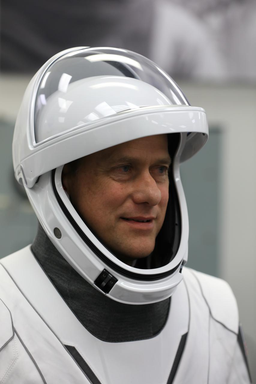 NASA’s SpaceX Crew-3 astronauts participate in a countdown dress rehearsal at the agency’s Kennedy Space Center in Florida on Oct. 28, 2021, to prepare for the upcoming Crew-3 launch. Tom Marshburn, pilot, runs through checkouts of his SpaceX spacesuit inside the crew suitup room in the Neil A. Armstrong Operations and Checkout Building. Marshburn, along with Raja Chari, pilot, Kayla Barron, mission specialist, and Matthias Maurer, with the European Space Agency, and also a mission specialist, will launch aboard the Crew Dragon atop the Falcon 9 to the International Space Station. Launch is targeted for no earlier than Nov. 6 at 11:36 p.m. EDT from Launch Complex 39A. Crew-3 is the third crew rotation flight to the space station for NASA’s Commercial Crew Program, and the first flight of a new Crew Dragon spacecraft. 