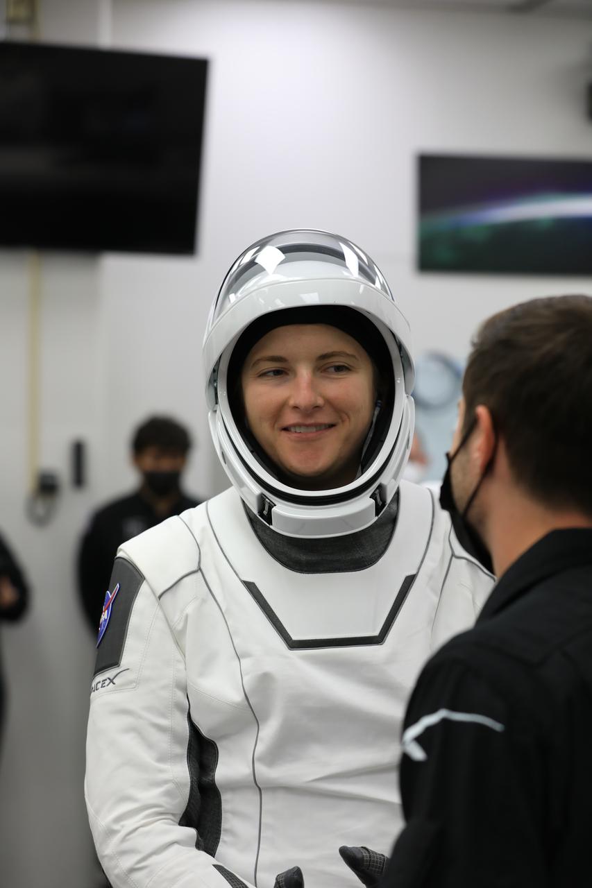 NASA’s SpaceX Crew-3 astronauts participate in a countdown dress rehearsal at the agency’s Kennedy Space Center in Florida on Oct. 28, 2021, to prepare for the upcoming Crew-3 launch. Kayla Barron, mission specialist, runs through checkouts of her SpaceX spacesuit inside the crew suitup room in the Neil A. Armstrong Operations and Checkout Building. Barron, along with Raja Chari, commander, Tom Marshburn, pilot, and Matthias Maurer, with the European Space Agency, and also a mission specialist, will launch aboard the Crew Dragon atop the Falcon 9 to the International Space Station. Launch is targeted for no earlier than Nov. 6 at 11:36 p.m. EDT from Launch Complex 39A. Crew-3 is the third crew rotation flight to the space station for NASA’s Commercial Crew Program, and the first flight of a new Crew Dragon spacecraft.