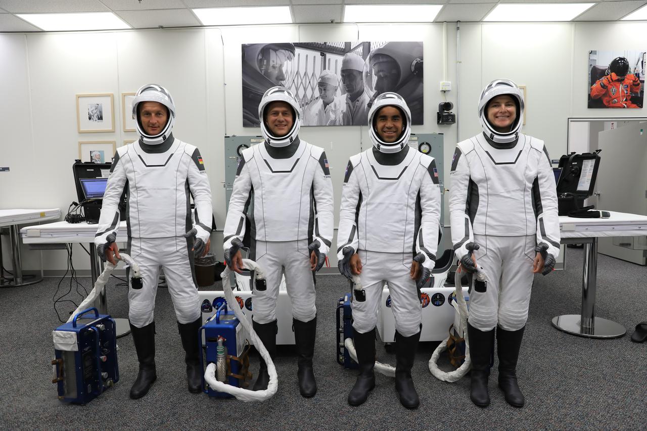 NASA’s SpaceX Crew-3 astronauts participate in a countdown dress rehearsal at the agency’s Kennedy Space Center in Florida on Oct. 28, 2021, to prepare for the upcoming Crew-3 launch. In their SpaceX spacesuits are, from left, Matthias Maurer,  with the European Space Agency and mission specialist; and NASA astronauts Tom Marshburn, pilot; Raja Chari, commander; and Kayla Barron, mission specialist. The four-person crew will launch aboard the Crew Dragon atop the Falcon 9 to the International Space Station. Launch is targeted for no earlier than Nov. 6 at 11:36 p.m. EDT from Launch Complex 39A. Crew-3 is the third crew rotation flight to the space station for NASA’s Commercial Crew Program, and the first flight of a new Crew Dragon spacecraft. 