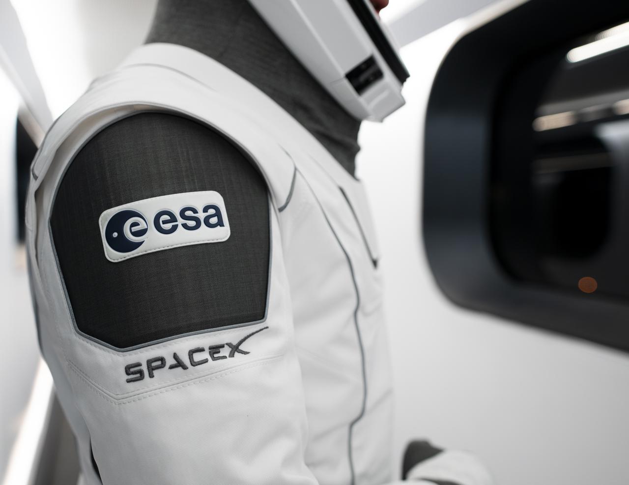 NASA’s SpaceX Crew-3 astronauts participate in a countdown dress rehearsal at the agency’s Kennedy Space Center in Florida on Oct. 28, 2021, to prepare for the upcoming Crew-3 launch. Matthias Maurer, with the European Space Agency (ESA), is inside the crew access arm leading to the company’s Crew Dragon spacecraft during the rehearsal. Maurer’s SpaceX spacesuit is embroidered with the ESA and SpaceX emblems. The four-person crew will launch aboard the Crew Dragon atop the Falcon 9 on Oct. 31 to the International Space Station. Launch is targeted for 2:21 a.m. EDT from Pad 39A. Crew-3 is the third crew rotation flight to the space station for NASA’s Commercial Crew Program, and the first flight of a new Crew Dragon spacecraft. 