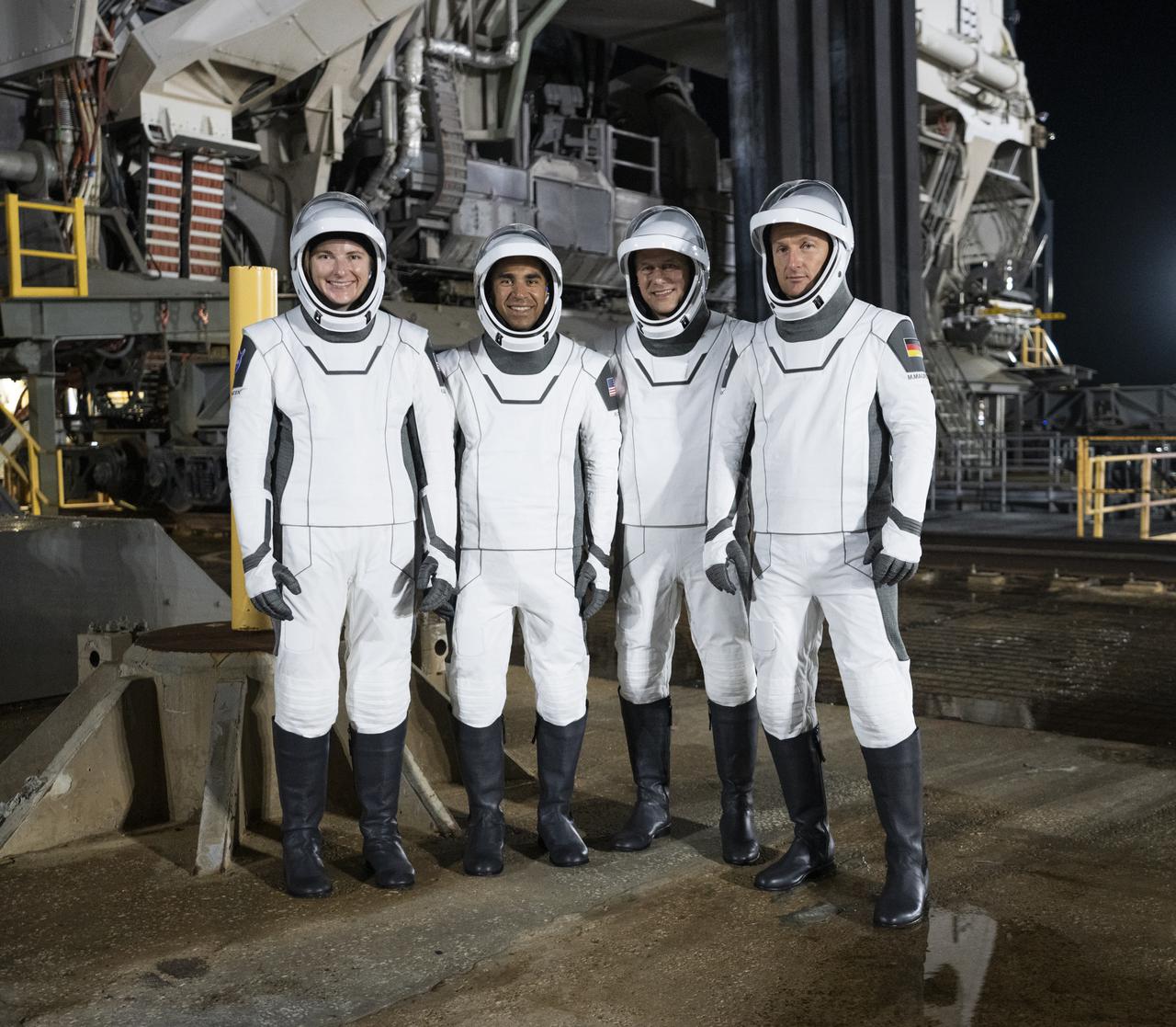 NASA’s SpaceX Crew-3 astronauts participate in a countdown dress rehearsal at the agency’s Kennedy Space Center in Florida on Oct. 28, 2021, to prepare for the upcoming Crew-3 launch. The astronauts are at Launch Pad 39A with the Falcon 9 and Crew Dragon behind them during the rehearsal. From left are NASA astronauts Kayla Barron, Raja Chari, Crew-3 commander, and Tom Marshburn, and European Space Agency astronaut Matthias Maurer. The four-person crew will launch aboard the Crew Dragon atop the Falcon 9 on Oct. 31 to the International Space Station. Launch is targeted for 2:21 a.m. EDT from Pad 39A. Crew-3 is the third crew rotation flight to the space station for NASA’s Commercial Crew Program, and the first flight of a new Crew Dragon spacecraft. 