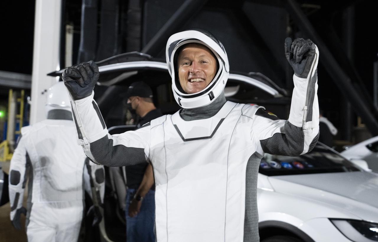 NASA’s SpaceX Crew-3 astronauts participate in a countdown dress rehearsal at the agency’s Kennedy Space Center in Florida on Oct. 28, 2021, to prepare for the upcoming Crew-3 launch. The astronauts are at the Neil Armstrong Operations and Checkout Building as they prepare to enter the Tesla cars for the trip to Launch Pad 39A during the rehearsal. In view is European Space Agency astronaut Matthias Maurer. The four-person crew will launch aboard the Crew Dragon atop the Falcon 9 on Oct. 31 to the International Space Station. Launch is targeted for 2:21 a.m. EDT from Pad 39A. Crew-3 is the third crew rotation flight to the space station for NASA’s Commercial Crew Program, and the first flight of a new Crew Dragon spacecraft.