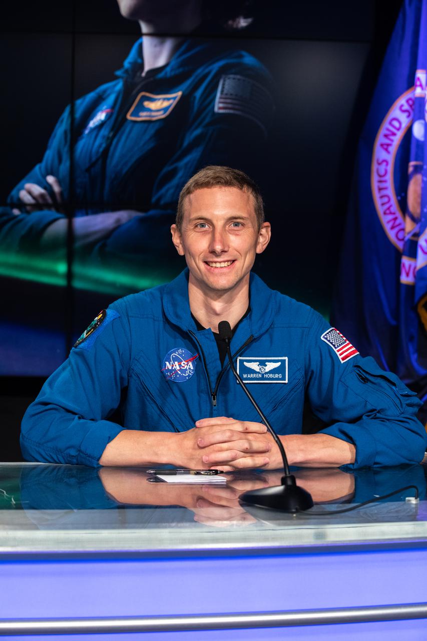 NASA astronaut Woody Hoburg speaks during a briefing for the upcoming SpaceX Crew-3 mission at the agency’s Kennedy Space Center in Florida on Oct. 29, 2021. The SpaceX Falcon 9 with Crew Dragon atop is scheduled to launch Oct. 31 at 2:21 a.m. EDT from Launch Complex 39A at Kennedy. Crew Dragon will carry four astronauts to the International Space Station for NASA’s Commercial Crew Program. Crew-3 is the third crew rotation flight to the space station, and the first flight of a new Crew Dragon spacecraft. 