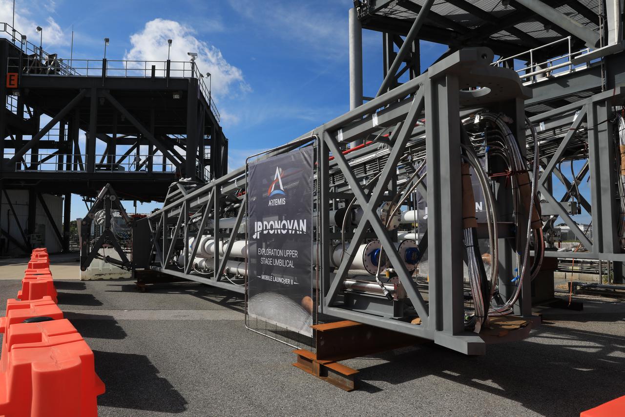 The first umbilical – one of many swing arms that will provide power, communications, and propellants to a larger configuration of NASA’s Space Launch System (SLS) rocket – for the agency’s mobile launcher 2 (ML2) arrives at the Launch Equipment Test Facility (LETF) at NASA’s Kennedy Space Center in Florida on Oct. 28, 2021. The umbilical will go through rounds of testing at the LETF to verify it functions properly before getting installed on the ML2 tower. This particular umbilical will provide propellants, environmental control systems, and a variety of purge gasses to the rocket’s Exploration Upper Stage. ML2 will be used to launch SLS Block 1B and Block 2 configurations to the Moon, starting with the Artemis IV mission, allowing NASA to send astronauts and heavy cargo to the lunar surface.