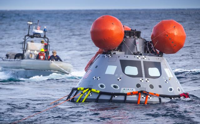 During Underway Recovery Test 9 (URT-9), NASA’s Landing and Recovery Team practices bringing a mock Orion capsule into the well deck of the USS John P. Murtha (LPD 26 The team is performing their final mission certification ahead of Artemis I.