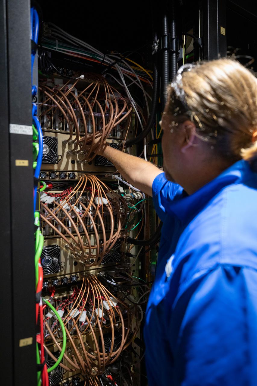 Weather Instrumentation Engineer Nick O’Connor works with the Tropospheric Doppler Radar Wind Profiler at Kennedy Space Center in Florida during an Artemis I weather simulation on Nov. 3, 2021. The simulation involved teams from Kennedy, Cape Canaveral Space Force Station, Johnson Space Center in Texas, and Marshall Space Flight Center in Alabama. The radar wind profiler delivers data – from 6,000 to 62,000 feet – every five minutes. It will be used as the primary upper level wind instrument for NASA’s Artemis missions, including Artemis I, the first launch of the agency’s Space Launch System rocket and the Orion spacecraft on a flight beyond the Moon.