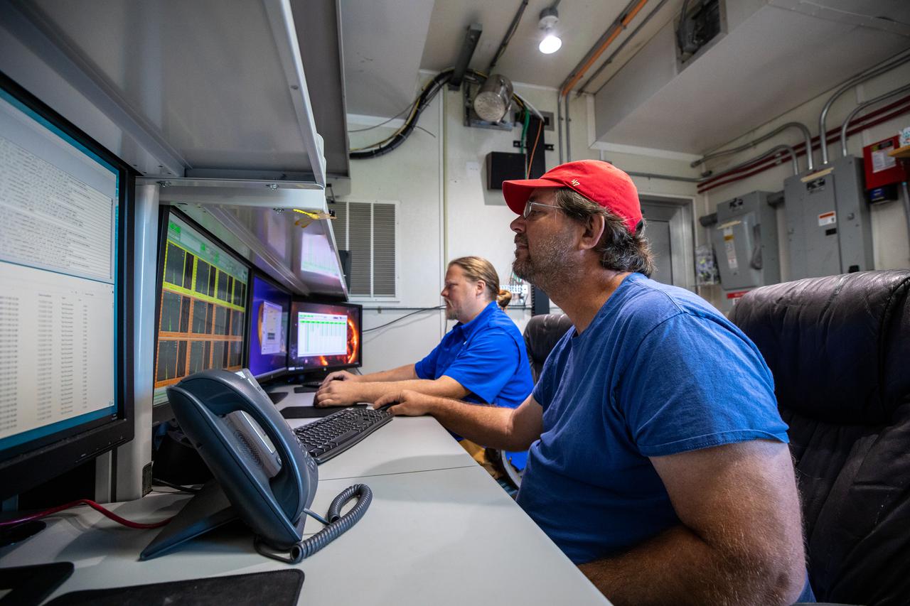 Weather Instrumentation Technician Gavin Oglesby, left, and Weather Instrumentation Engineer Nick O’Connor work with the Tropospheric Doppler Radar Wind Profiler at Kennedy Space Center in Florida during an Artemis I weather simulation on Nov. 3, 2021. The simulation involved teams from Kennedy, Cape Canaveral Space Force Station, Johnson Space Center in Texas, and Marshall Space Flight Center in Alabama. The radar wind profiler delivers data – from 6,000 to 62,000 feet – every five minutes. It will be used as the primary upper level wind instrument for NASA’s Artemis missions, including Artemis I, the first launch of the agency’s Space Launch System rocket and the Orion spacecraft on a flight beyond the Moon.