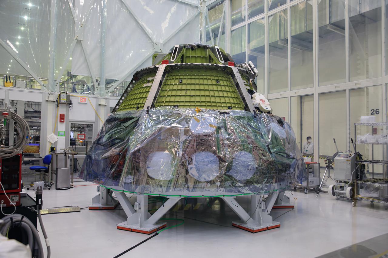 Assembly on the Artemis II Orion spacecraft that will carry the first Artemis crew on its lunar-bound mission continues at NASA’s Kennedy Space Center in Florida on Nov. 5, 2021. Located in the clean room inside the high bay of the Neil Armstrong Operations and Checkout Building, teams have been working on the closeout welding for the propulsion and Environmental Control and Life Support System. Once complete, the crew module will move out of the clean room and into its workstation to continue with subsystem installations. With Artemis missions, NASA will land the first woman and the first person of color on the lunar surface. Artemis II will be the first crewed flight test of NASA’s Space Launch System and Orion, paving the way for human exploration to the Moon and Mars. 