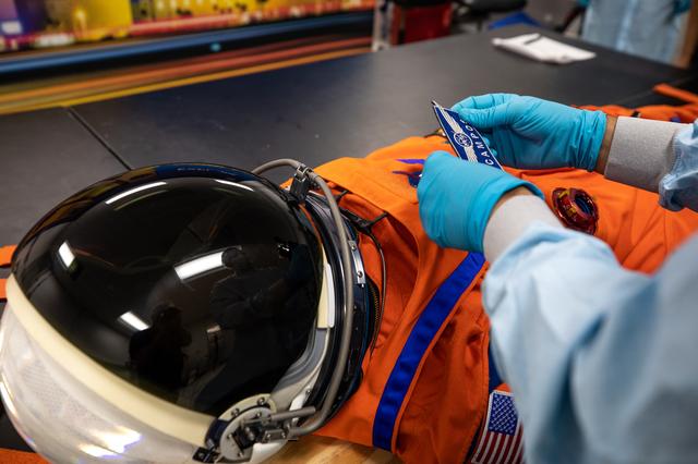 NASA image: Artemis I Moonikin Campos Inspection and Install