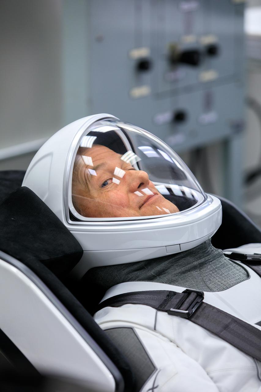 NASA SpaceX Crew-3 mission astronauts are in the suit-up room in the Astronaut Crew Quarters inside Kennedy Space Center’s Neil A. Armstrong Operations and Checkout Building on launch day, Nov. 10, 2021. A team of SpaceX suit technicians will help them as they put on their custom-fitted spacesuits and check the suits for leaks. In view is NASA astronaut Tom Marshburn, commander. The Falcon 9 rocket with Crew Dragon Endurance will launch the four-person crew to the International Space Station for NASA’s Commercial Crew Program. Crew-3 is scheduled to launch at 9:03 p.m. EST from Launch Complex 39A at Kennedy. 