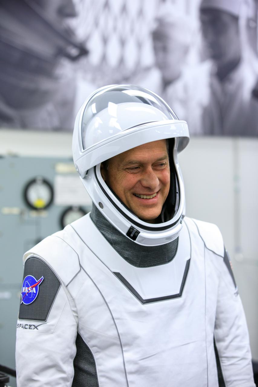 NASA SpaceX Crew-3 mission astronauts are in the suit-up room in the Astronaut Crew Quarters inside Kennedy Space Center’s Neil A. Armstrong Operations and Checkout Building on launch day, Nov. 10, 2021. A team of SpaceX suit technicians will help them as they put on their custom-fitted spacesuits and check the suits for leaks. In view is NASA astronaut Tom Marshburn, pilot. The Falcon 9 rocket with Crew Dragon Endurance will launch the four-person crew to the International Space Station for NASA’s Commercial Crew Program. Crew-3 is scheduled to launch at 9:03 p.m. EST from Launch Complex 39A at Kennedy. 