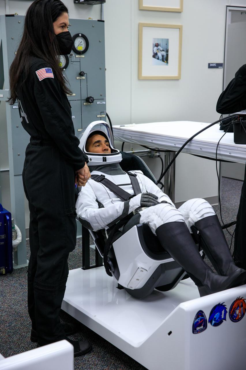 NASA SpaceX Crew-3 mission astronauts are in the suit-up room in the Astronaut Crew Quarters inside Kennedy Space Center’s Neil A. Armstrong Operations and Checkout Building on launch day, Nov. 10, 2021. A team of SpaceX suit technicians will help them as they put on their custom-fitted spacesuits and check the suits for leaks. In view is NASA astronaut Raja Chari, commander. The Falcon 9 rocket with Crew Dragon Endurance will launch the four-person crew to the International Space Station for NASA’s Commercial Crew Program. Crew-3 is scheduled to launch at 9:03 p.m. EST from Launch Complex 39A at Kennedy. 