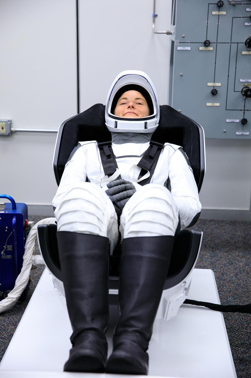 NASA SpaceX Crew-3 mission astronauts are in the suit-up room in the Astronaut Crew Quarters inside Kennedy Space Center’s Neil A. Armstrong Operations and Checkout Building on launch day, Nov. 10, 2021. A team of SpaceX suit technicians will help them as they put on their custom-fitted spacesuits and check the suits for leaks. In view is NASA astronaut Kayla Barron, mission specialist. The Falcon 9 rocket with Crew Dragon Endurance will launch the four-person crew to the International Space Station for NASA’s Commercial Crew Program. Crew-3 is scheduled to launch at 9:03 p.m. EST from Launch Complex 39A at Kennedy. 
