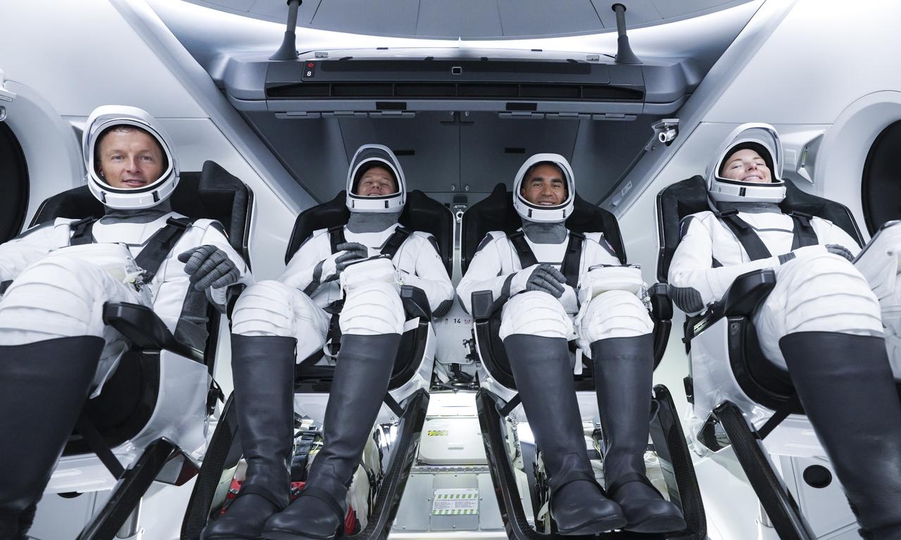 The SpaceX Crew-3 astronauts are secured in their seats inside the Crew Dragon at Launch Complex 39A at NASA’s Kennedy Space Center in Florida on Nov. 10, 2021. In view from left are: Matthias Maurer, ESA (European Space Agency) astronaut and mission specialist; and NASA astronauts Tom Marshburn, pilot; Raja Chari, commander; and Kayla Barron, mission specialist; along with. The Falcon 9 rocket with Crew Dragon Endurance will launch the four-person crew to the International Space Station for the agency’s Commercial Crew Program. Crew-3 is scheduled to launch at 9:03 p.m. EST from historic Launch Pad 39A at Kennedy. 
