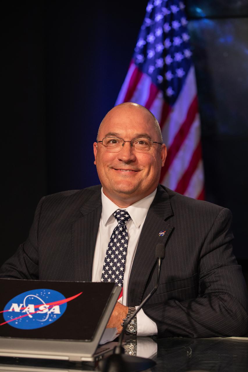 Greg Harland, NASA Communications, moderates a prelaunch news conference for NASA’s Imaging X-ray Polarimetry Explorer (IXPE) spacecraft on Dec. 7, 2021 at NASA’s Kennedy Space Center in Florida. IXPE is scheduled to launch no earlier than 1 a.m. EST Thursday, Dec. 9, on a SpaceX Falcon 9 rocket from Kennedy’s Launch Complex 39A. NASA’s Launch Services Program is managing this launch. NASA’s Marshall Space Flight Center in Huntsville, Alabama, manages the IXPE mission. Ball Aerospace, headquartered in Broomfield, Colorado, manages spacecraft operations with support from the University of Colorado at Boulder. NASA’s Goddard Space Flight Center in Greenbelt, Maryland, manages the Explorers Program for the agency’s Science Mission Directorate in Washington. The U.S. Space Force’s Space Launch Delta 45 provides range support for this launch. SpaceX is providing the launch vehicle for this mission.