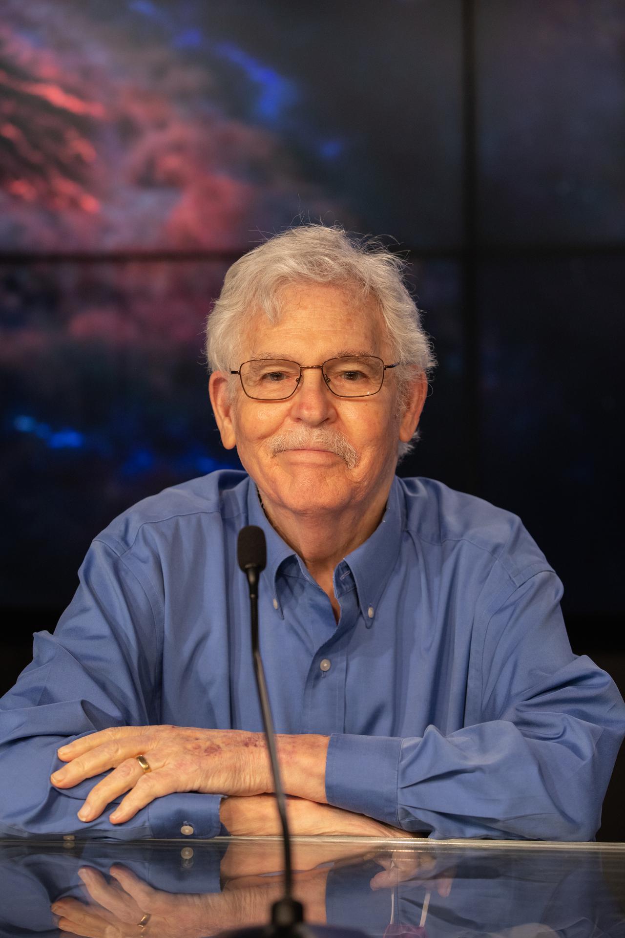 Portrait of Martin Weisskopf at a news conference for the IXPE spacecraft