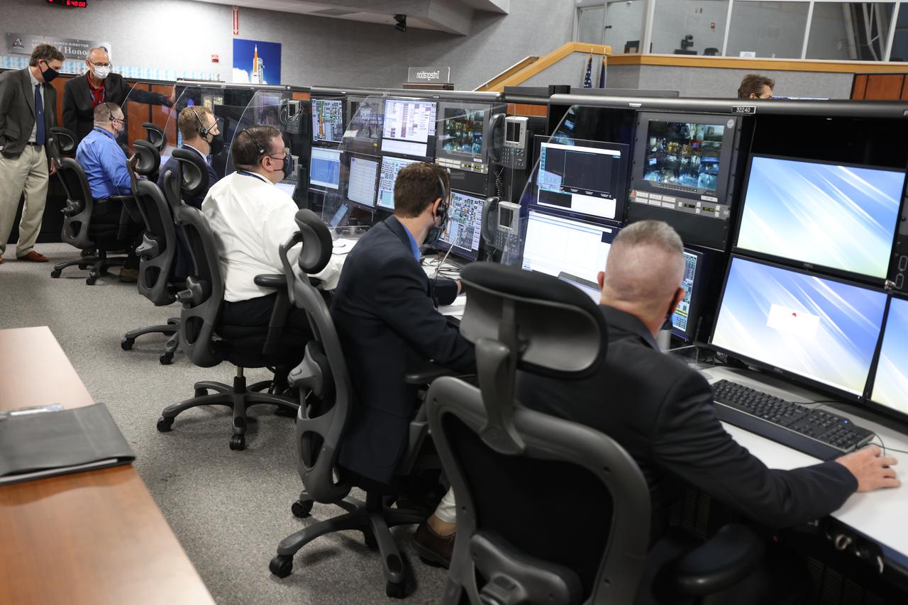 Launch team members are seated at the Integration consoles inside Firing Room 1 of the Launch Control Center at NASA’s Kennedy Space Center in Florida on Dec. 13, 2021. They are participating in a joint integrated simulation for the Artemis I launch that covered both cryogenic loading and terminal countdown portions of prelaunch activities. Members of NASA’s mission management team and launch team conducted the simulation together. The Kennedy team was certified for the Artemis I launch. During Artemis I, the agency’s Orion spacecraft will lift off from Kennedy aboard NASA’s most powerful rocket – the Space Launch System – to fly farther than any spacecraft built for humans has ever flown. Through NASA’s Artemis missions, the agency, along with commercial and international partners, will establish a sustainable human presence on the Moon to prepare for missions to Mars.