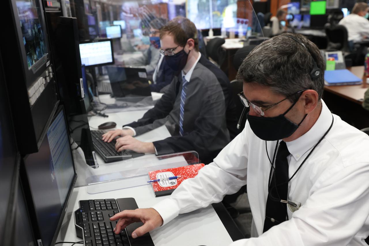 Launch team members are seated at the Liquid Oxygen consoles inside Firing Room 1 of the Launch Control Center at NASA’s Kennedy Space Center in Florida on Dec. 13, 2021. They are participating in a joint integrated simulation for the Artemis I launch that covered both cryogenic loading and terminal countdown portions of prelaunch activities. Members of NASA’s mission management team and launch team conducted the simulation together. The Kennedy team was certified for the Artemis I launch. During Artemis I, the agency’s Orion spacecraft will lift off from Kennedy aboard NASA’s most powerful rocket – the Space Launch System – to fly farther than any spacecraft built for humans has ever flown. Through NASA’s Artemis missions, the agency, along with commercial and international partners, will establish a sustainable human presence on the Moon to prepare for missions to Mars.
