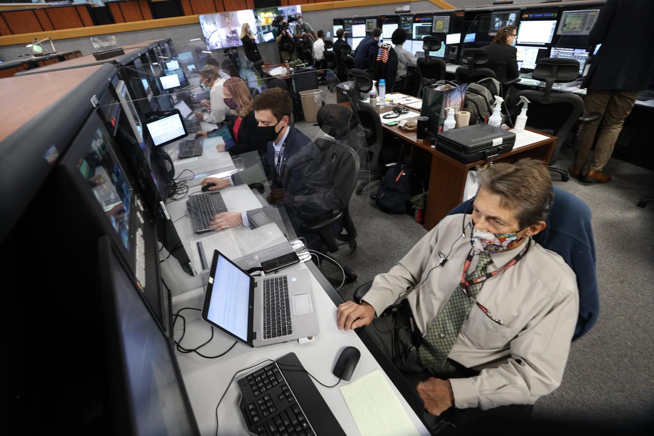Launch team members are seated at the Main Propulsion System consoles inside Firing Room 1 of the Launch Control Center at NASA’s Kennedy Space Center in Florida on Dec. 13, 2021. They are participating in a joint integrated simulation for the Artemis I launch that covered both cryogenic loading and terminal countdown portions of prelaunch activities. Members of NASA’s mission management team and launch team conducted the simulation together. The Kennedy team was certified for the Artemis I launch.  During Artemis I, the agency’s Orion spacecraft will lift off from Kennedy aboard NASA’s most powerful rocket – the Space Launch System – to fly farther than any spacecraft built for humans has ever flown. Through NASA’s Artemis missions, the agency, along with commercial and international partners, will establish a sustainable human presence on the Moon to prepare for missions to Mars. 