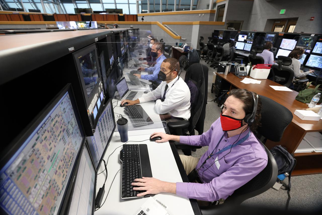 Launch team members are seated at consoles inside Firing Room 1 of the Launch Control Center at NASA’s Kennedy Space Center in Florida on Dec. 13, 2021. They are participating in a joint integrated simulation for the Artemis I launch that covered both cryogenic loading and terminal countdown portions of prelaunch activities. Members of NASA’s mission management team and launch team conducted the simulation together. The Kennedy team was certified for the Artemis I launch. During Artemis I, the agency’s Orion spacecraft will lift off from Kennedy aboard NASA’s most powerful rocket – the Space Launch System – to fly farther than any spacecraft built for humans has ever flown. Through NASA’s Artemis missions, the agency, along with commercial and international partners, will establish a sustainable human presence on the Moon to prepare for missions to Mars. 